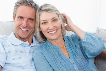 A retired couple share their restored smiles